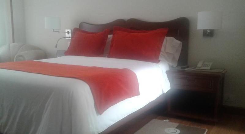 Hotel Santa Lucia Boutique Spa Bogotá Exteriör bild A bed with a duvet cover